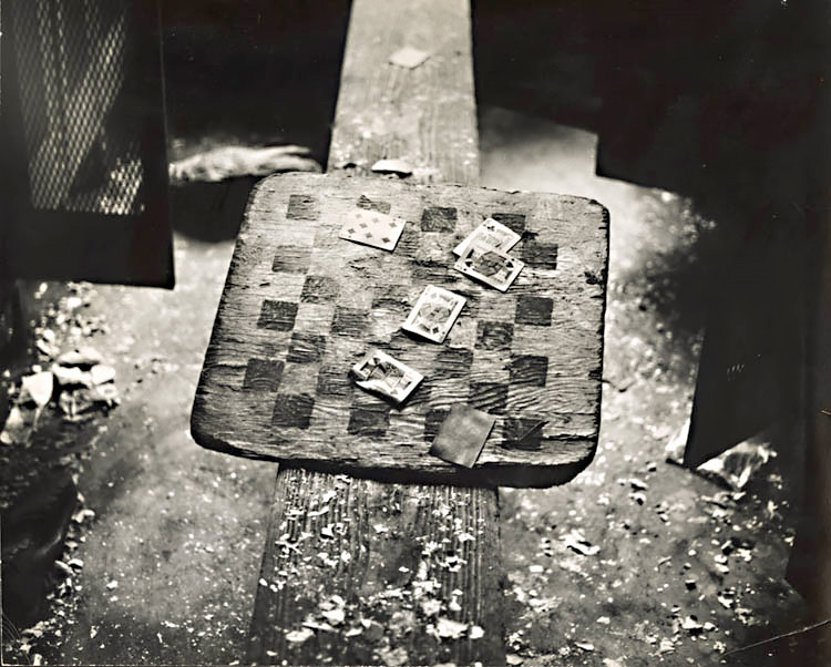 Cards and Checkerboard in Abandoned Locker Room for Railroad Workers 1970c<p>© Arthur Tress</p>