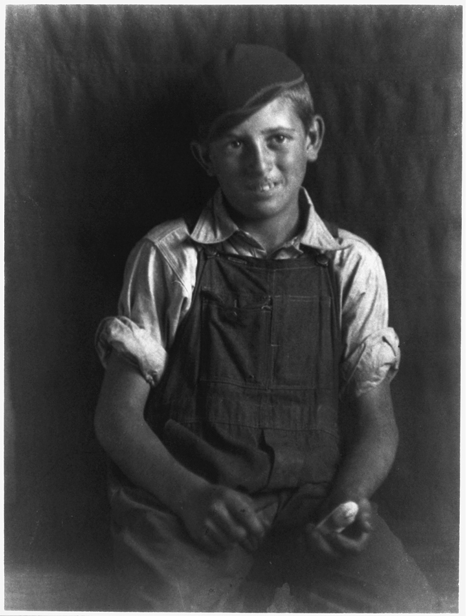 Boy in overalls and cap, circa 1930<p>© Doris Ulmann</p>