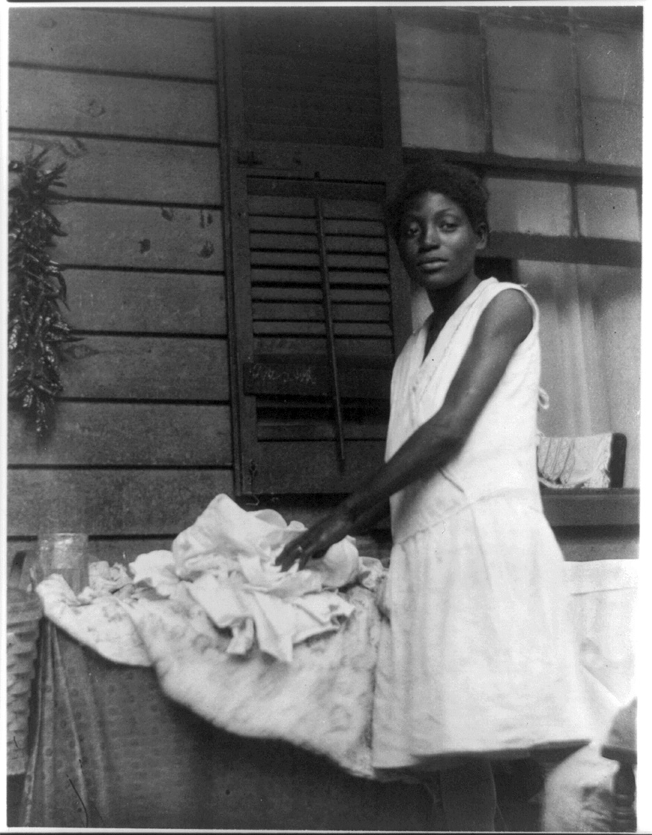 Black girl ironing, circa 1930<p>© Doris Ulmann</p>