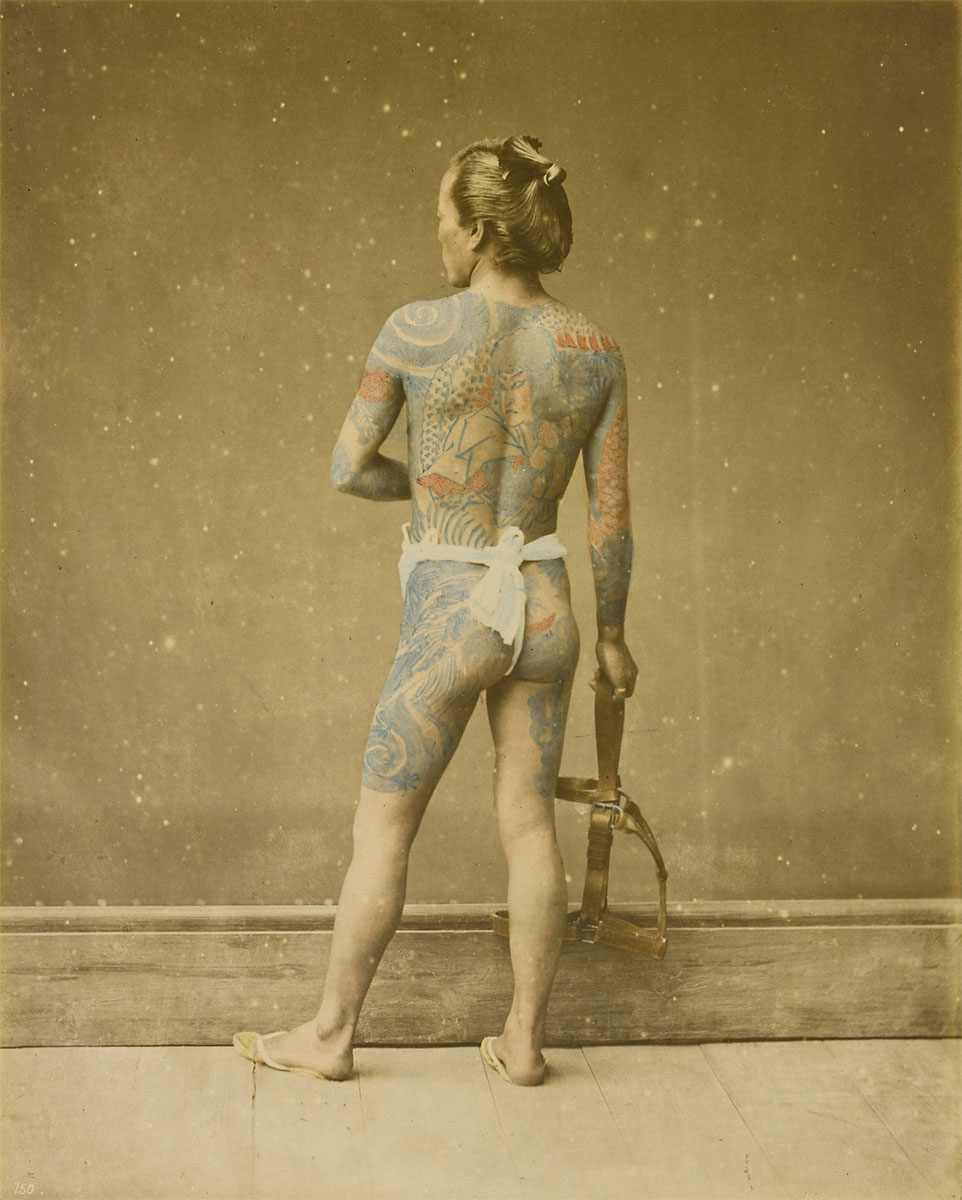 Portrait of a man with Japanese Irezumi Tattoo, between 1868 and 1880<p>© Baron Raimund von Stillfried</p>