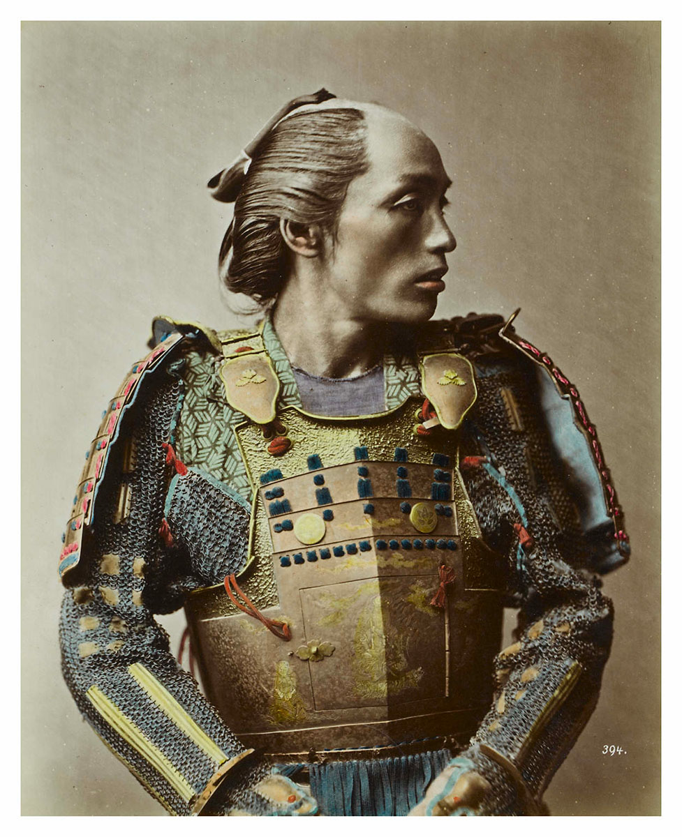 Handcolored portrait of a Japanese man in armour, 1881 - Capital Collections, Edinburgh Libraries<p>© Baron Raimund von Stillfried</p>