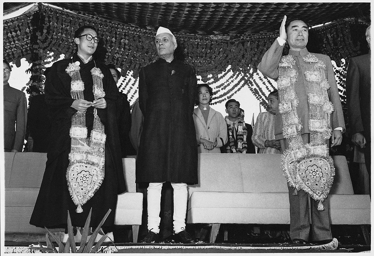 The Dalai Lama, Nehru and Zhou Enlai in India, at the UNESCO Buddhist Conference in Ashok Hotel, New Delhi, 1956<p>© Homai Vyarawalla</p>