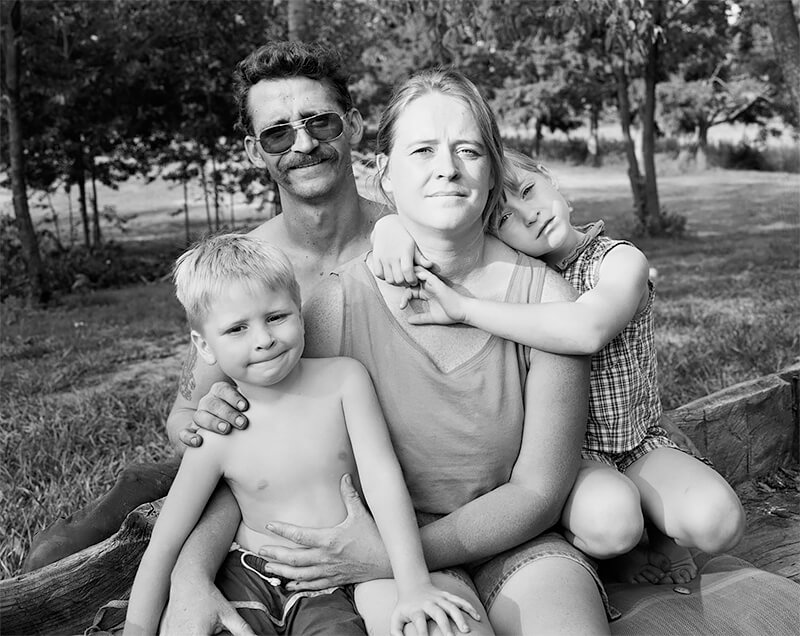 Keith and Coleen Morlan with their children, Charlie and Jessica, Norton OH, 1999<p>© Joe Vitone</p>