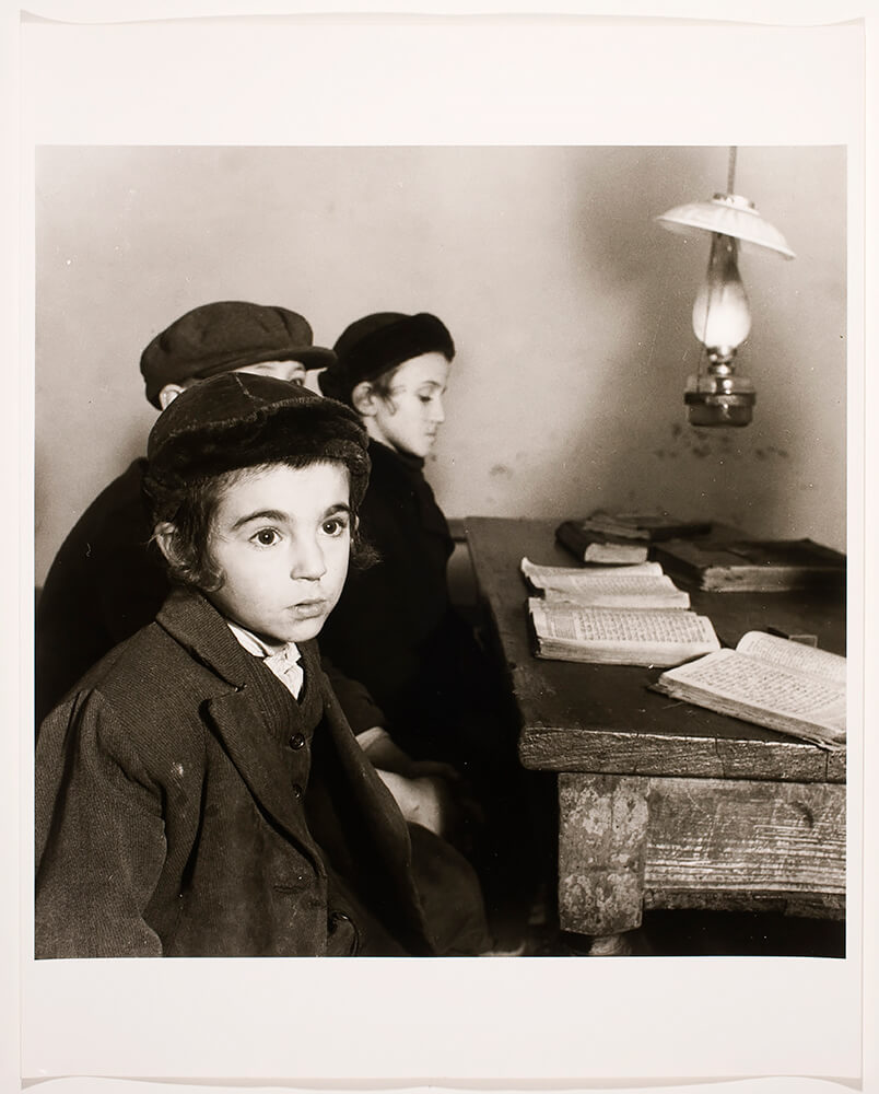 David Eckstein, 7 years old, and classmates in cheder (Jewish elementary school), Brod, (Carpathian Ruthenia/Czechoslovakia)], ca. 1938<p>Courtesy The Magnes Collection of Jewish Art and Life, UC Berkeley / © Roman Vishniac</p>